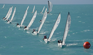J/70 sailboats head to the windward mark Tuesday, Jan. 17, 2017, at the Quantum Key West Race Week sailing regatta in Key West. Images: Andy Newman